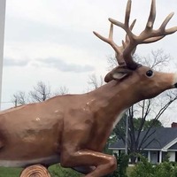 Giant Statue Of Deer Jumping A Log