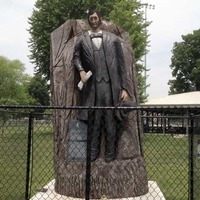 Abraham Lincoln on a Log