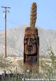 Carved Indian head statue.