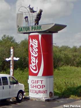 Gator park Coke can airboat bear.