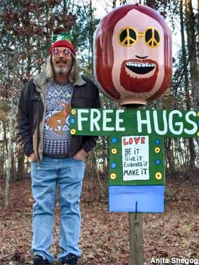 Sam Granger offers free hugs.