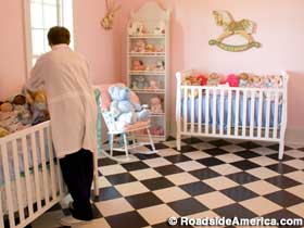 Pink nursery for the girl babies.