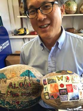 Postmaster Gary Lam and a couple of mail-ready nuts.