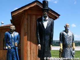 Grant, Lincoln, Lee -- chiseled in wood.