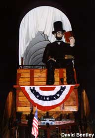 Giant Lincoln and covered wagon.  