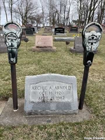 Double parking meter grave.