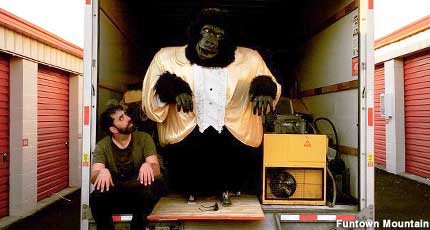 Will Russell and his animatronic gorilla pal.