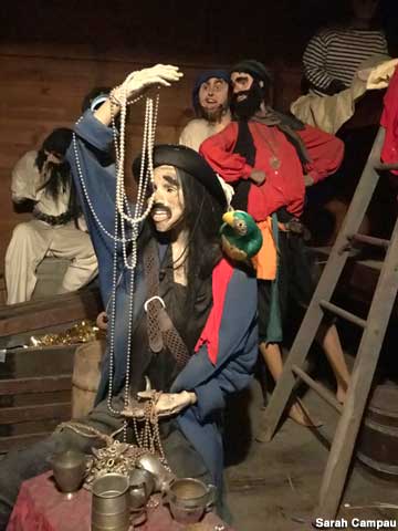 Pirates dummies inspect their plunder.