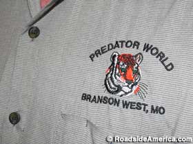 Predator World employee shirt.