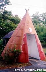 Teepee attached to cabin.