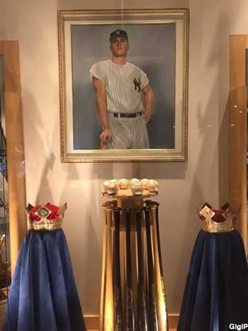 Roger Maris display of balls, bats, crowns.