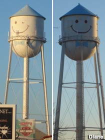 Two faces of Mr. Smiley Water Tower.