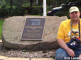 Erik forces a smile at the Palisades Amusement Park plaque.