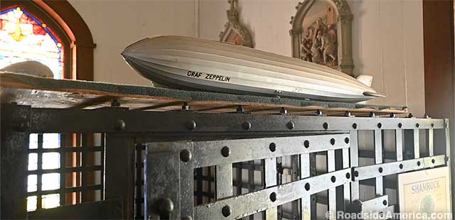 Graf Zeppelin model is parked atop Lakehurst's first jail cell.