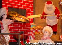 Santa makes pizza at Fountains of Wayne.