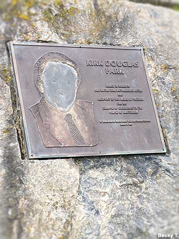 Kirk Douglas Park plaque and boulder.