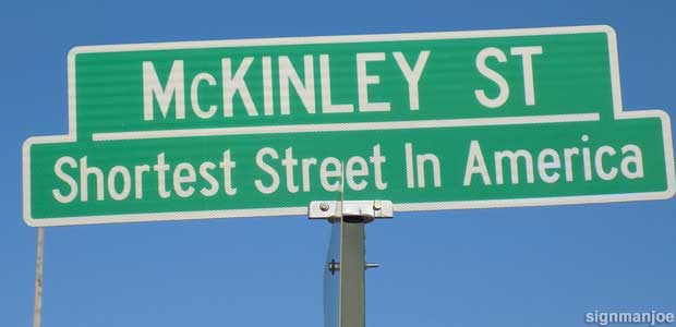 Shortest Street In America sign.