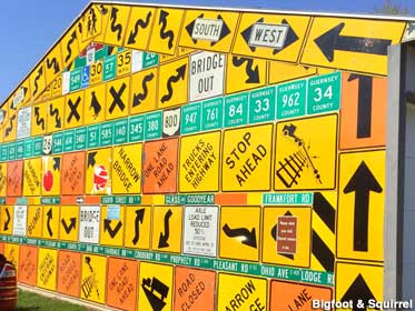 Wall of road signs.