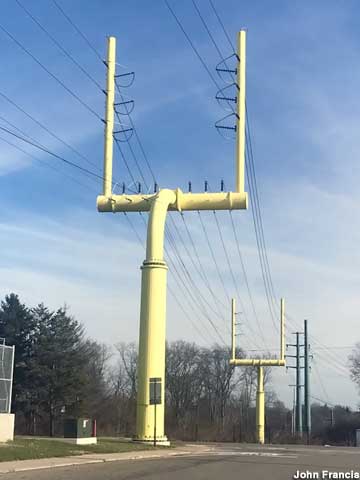 Goal post power line towers.