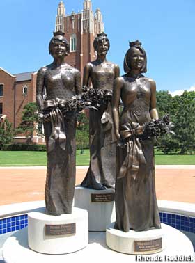 Statues of three Miss Americas.