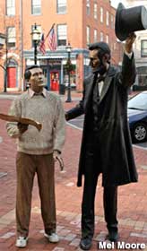 Abe and Perry stroll the square.