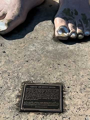 Feet and plaque.