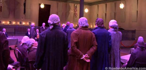 From the back you can pretend you are the most forgotten Founding Father, your view chiefly of powdered wigs.