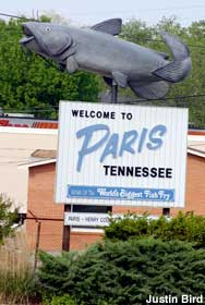 Giant fish on sign.