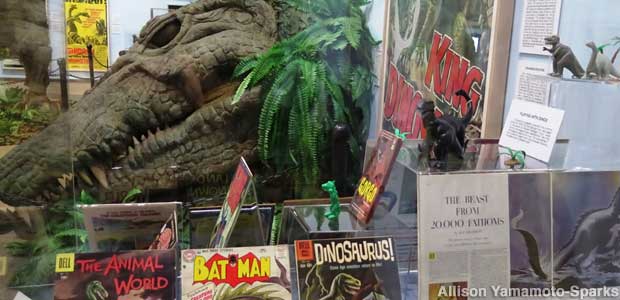 Pop culture dinosaurs: comics, collectibles, and a giant croc head from the movie 