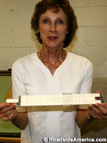 Michele shows off slide rule.