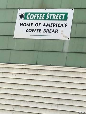 Sign for Coffee Street, Home of America's Coffee Break.