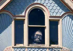 Muffler Man - Bunyan head in window.