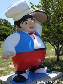 Burger chef statue.