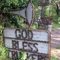 Christian Signs Made of Rusty Chains