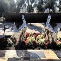 9/11 Memorial Beam Held By Dove Hands
