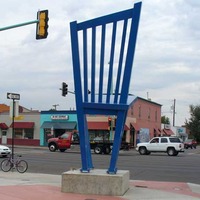 16-Foot-Tall Blue Chair on Three Legs