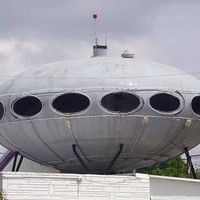 Futuro UFO House Atop a Strip Club