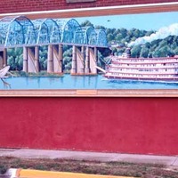 Fake Mural Painter in Town of Murals