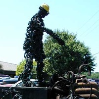 20-Foot-Tall Steelworker Made of Junk