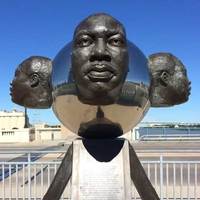 MLK Heads on a Chrome Orb
