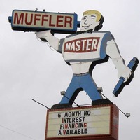 Muffler-Chested Man Sign