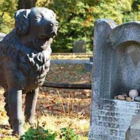 Dog Statue on Child's Grave