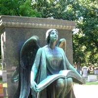 Angel With Book of Life in Lap
