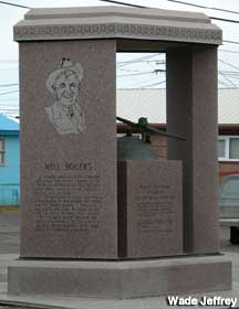 Large, outdoor granite memorial with an engraved portrait of Will Rogers.