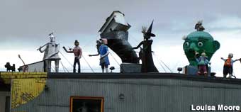 Rooftop home-made outdoor sculptures of the main characters from the Wizard of Oz.