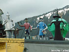 Home-made outdoor sculptures of the main characters from the Wizard of Oz.