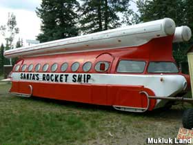 Super-streamlined red and white bus with 