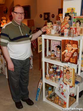 Tim Hollis stands next to a display of Bob's Big Boy figurines.