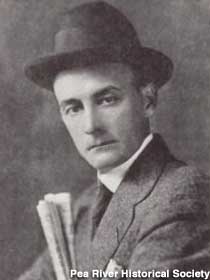 Bon Fleming, circa 1920, wears a hat and suit for a studio portrait.
