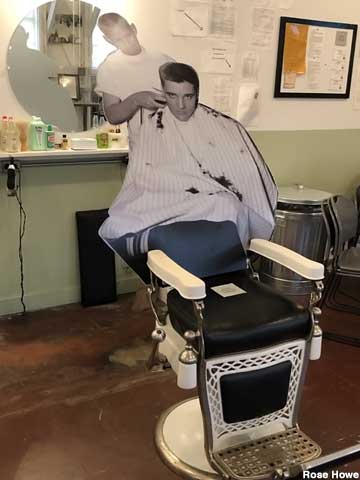 Elvis gets a haircut.